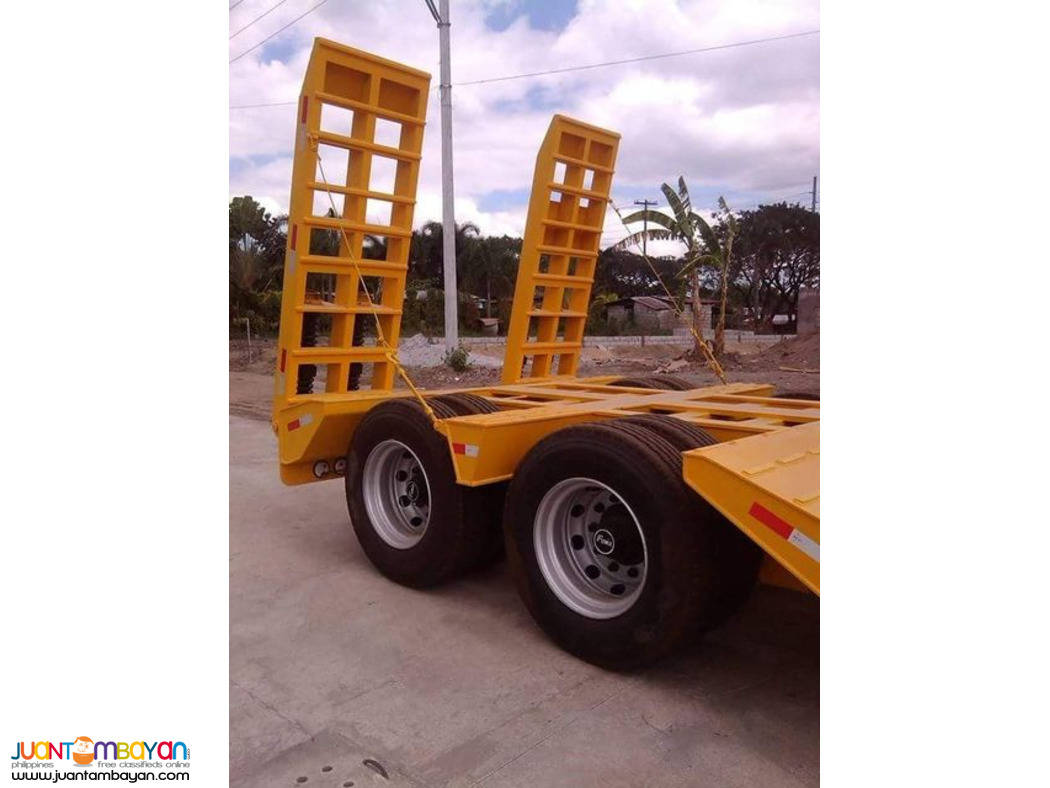 LOW BED TRAILER 8 WHEELERS DOUBLE AXLE (BED SIZE 20 FT 40 TONS)